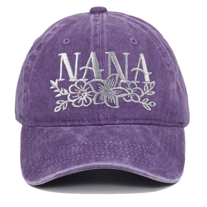 Close-up of Nana floral embroidery on purple washed vintage cotton baseball cap