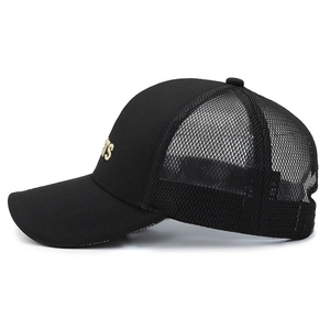 Black mesh trucker cap with gold BTS embroidery and curved brim for sun protection