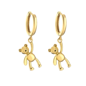 Polished gold teddy bear charm hoop earrings for women presented on white background