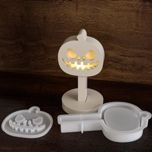 Silicone mold for Halloween pumpkin lamp with glowing resin finish and base support
