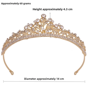 Close-up of golden bridal tiara with rhinestones showing 4.3cm height and 14cm diameter