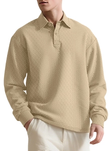 Detailed view of men's long sleeve polo shirt with textured knit and lapel button design