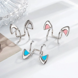 Three pairs of cute silver kitten ear clips with colorful enamel detailing for non-pierced ears
