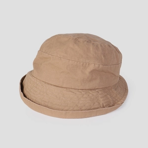 Detail of khaki cotton sun hat showing fine parallel stitching on the brim and fabric texture