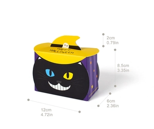 Macro view of purple Halloween cat candy box with yellow wizard hat and Happy Halloween text