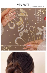 Close-up of golden U-shaped hair pins with pearls and crystals in vintage Chinese style