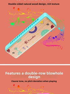Detail of 16-hole wooden harmonica showing double-row blow holes and cartoon giraffe print