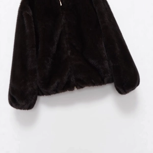 Women's faux fur bomber jacket in dark brown featuring soft plush texture and ribbed hem