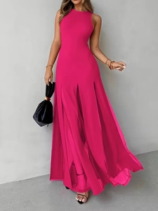 Detail view of the rose pink sleeveless dress with high slit hemline and neck halter design
