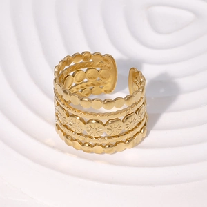 Retro hollow wide multi-layer stainless steel gold ring featuring star patterns and open band
