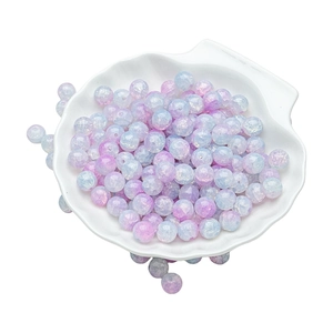 Pink and purple gradient 10mm cracked glass beads for DIY jewelry making in a shell bowl