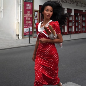 Elegant red polka dot dress with vintage white collar and slim fit for chic summer style