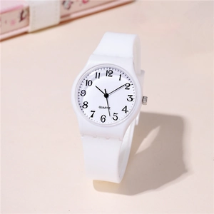 Minimalist white quartz watch with pink silicone strap and clear numeric dial for students