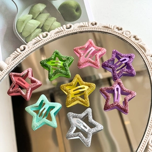 Set of 8 colorful glittery Y2K star-shaped hair clips in various bright colors
