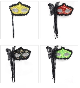 Detailed set of handheld sequin masquerade masks with butterfly accents and sticks