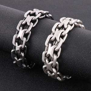 Rugged interlocking stainless steel curb chain bracelet for men in silver and grey