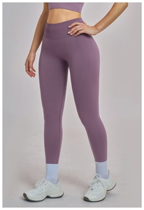 Close-up of seamless dark purple yoga pants featuring high-waist body shaping texture