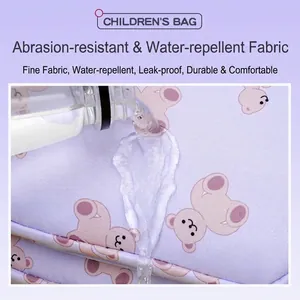 Waterproof purple Oxford fabric of a cute bear kids backpack showing wear-resistance