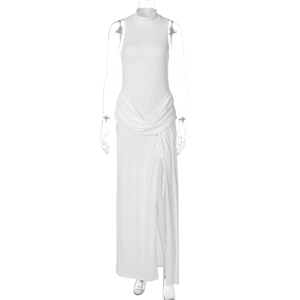 Detail of elegant white sleeveless maxi dress featuring waist pleats and a side high slit
