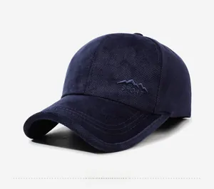 Detail of dark blue baseball cap with SPORT embroidery and premium thermal fabric texture
