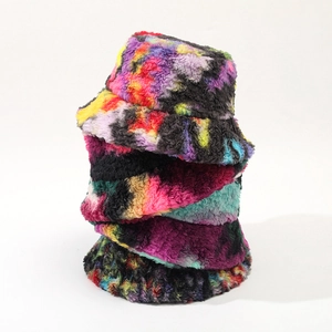 Colorful tie-dye plush bucket hats in soft faux fur for autumn and winter warmth