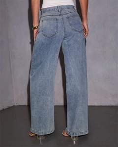 Rear view of light blue wide-leg denim jeans with high-waist fit and draped texture