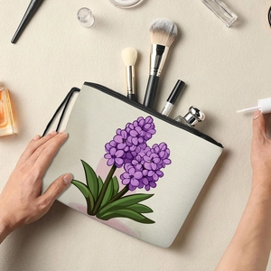 Floral canvas makeup bag with hyacinth print and black zipper for versatile storage