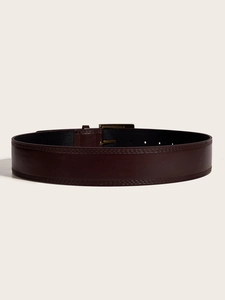 Detail of brown leather wide belt with gold square buckle and double stitching decoration
