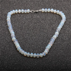 Polished opal-like natural stone beaded necklace with a secure silver lobster clasp