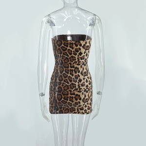 Detailed view of shimmering sequins and classic leopard print on a strapless dress