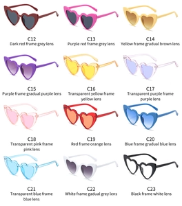 Detailed grid view showcasing twelve assorted colors of heart-shaped sunglasses for kids