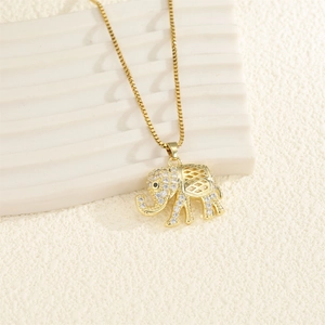 Minimalist gold plated elephant necklace with sparkling cubic zirconia on a box chain