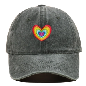 Detailed view of rainbow heart embroidery on vintage washed cotton baseball cap