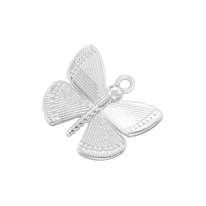 Detailed macro view of silver butterfly pendant with textured metallic finish and fine details