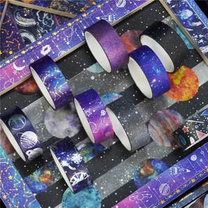 Starry galaxy washi tape set with gold foil constellations for DIY journals and crafts