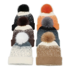 Winter knit pom-pom beanies for women in six assorted colors with snowflake textures