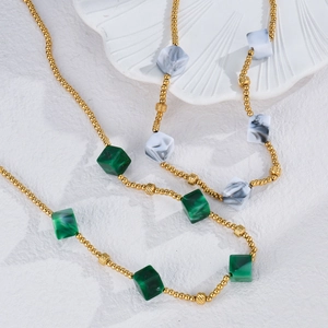 Bohemian gold beaded necklace with green and marble texture cube resin beads