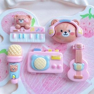 Five-piece pink musical resin set with bear, guitar, keyboard, and radio for DIY crafts