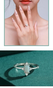 Close-up of S925 silver ring with rectangular opal stone and small diamonds inlay