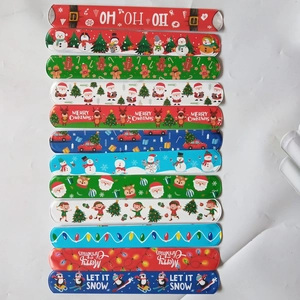 Set of 12 festive Christmas snap bracelets featuring various holiday themed patterns