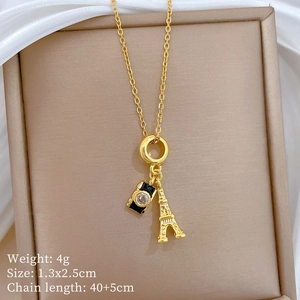 Detail of camera and Eiffel Tower pendants with gold chain dimensions and weight info