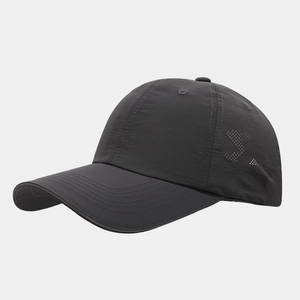 Detail of star-shaped laser cut perforations on quick-dry nylon sports baseball cap