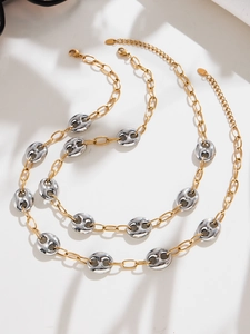 Détail du collier chaîne café bicolore en acier inoxydable avec polissage miroir