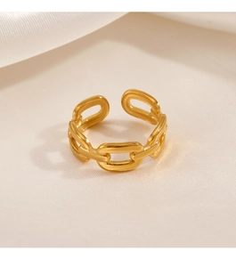Macro shot of 18K gold plated oval chain link open ring on minimalist silk fabric