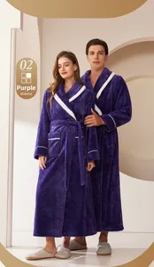 Detail showing the purple flannel waffle texture and white piping on couple bathrobes