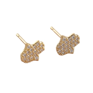 Exquisite golden ginkgo leaf stud earrings set with sparkling cubic zirconia on white background