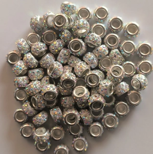 Close-up of sparkling multicolor crystal large hole beads for DIY jewelry making