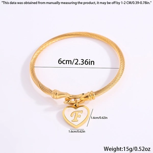 Golden titanium steel heart charm bracelet with letter F and detailed measurement info