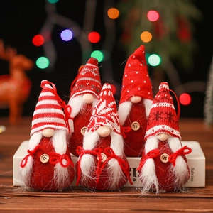 Set of 5 red knitted Christmas gnomes with white beards and festive pointed hats