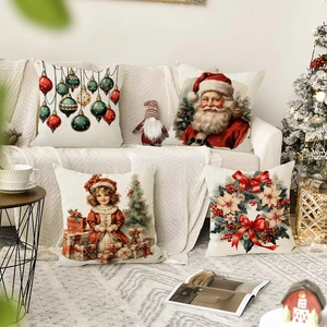 Detailed close-up of four linen Christmas pillow covers on a cozy sofa with holiday decor